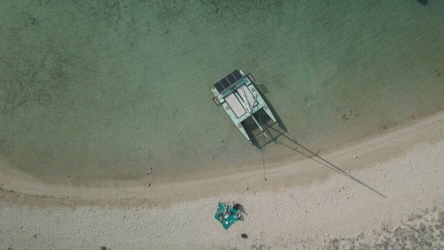 aerial view of green solar-powered boat